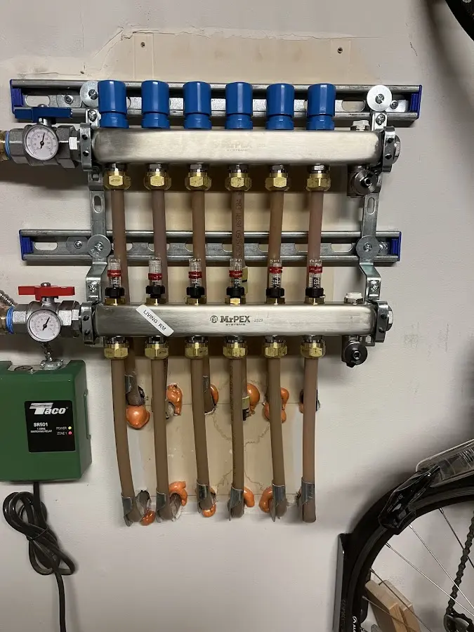 Plumber performing Gas Line Installation at a residential property in Wiscasset